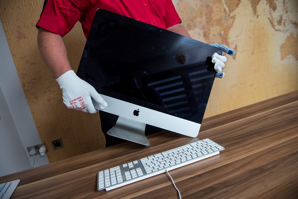 ws-dennison-carrying-imac-during-commercial-removal